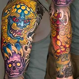 Traditional Japanese Irezumi sleeve tattoo featuring a pair of Karajishi, guardian lion-dog figures often referred to as Foo Dogs, designed by Jesse Dee at House of Wolves Tattoo, Geelong