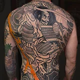 Work in progress on a traditional Japanese Irezumi large scale back tattoo depicting a samurai poised to strike, designed by Jesse Dee at House of Wolves Tattoo, Geelong